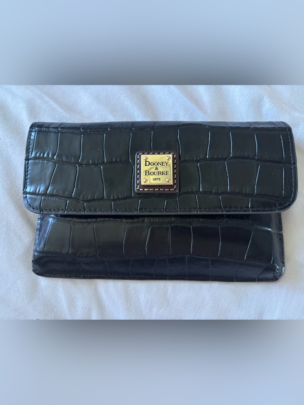 Dooney and Bourke wristlet in crocodile print.